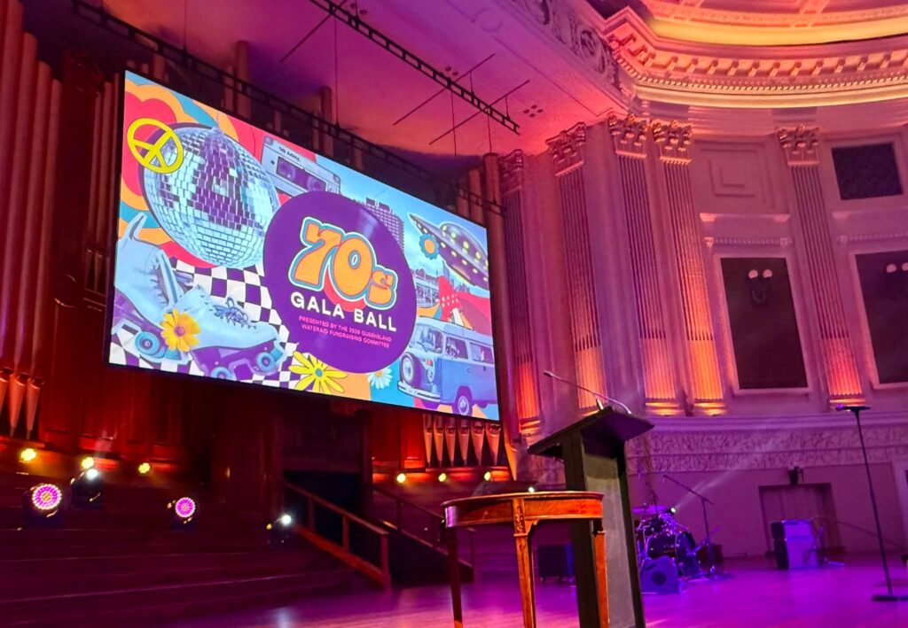 1970s-themed Queensland WaterAid Gala Ball Poster at Brisbane City Hall