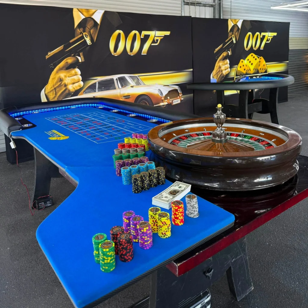 Casino Royale roulette and blackjack tables with 007 backdrop