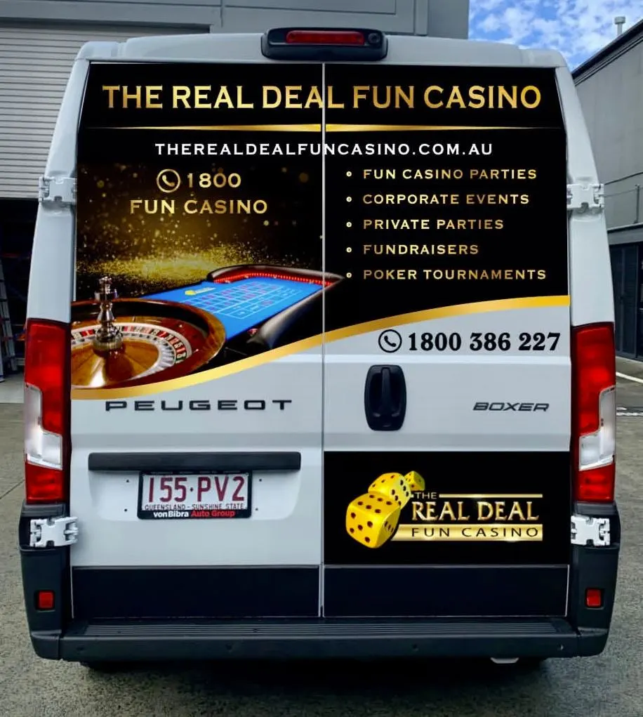 The Real Deal Fun Casino van with new signage for mobile casino entertainment